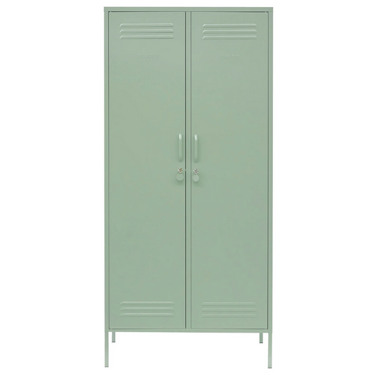 Green metal locker with two doors on a white background