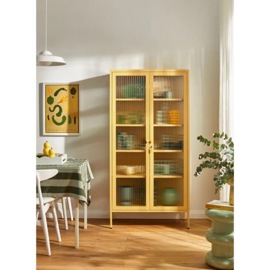 Glass panel mustard cabinet in dining room