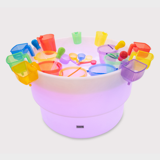 Colour sand and water toys in a water mood table
