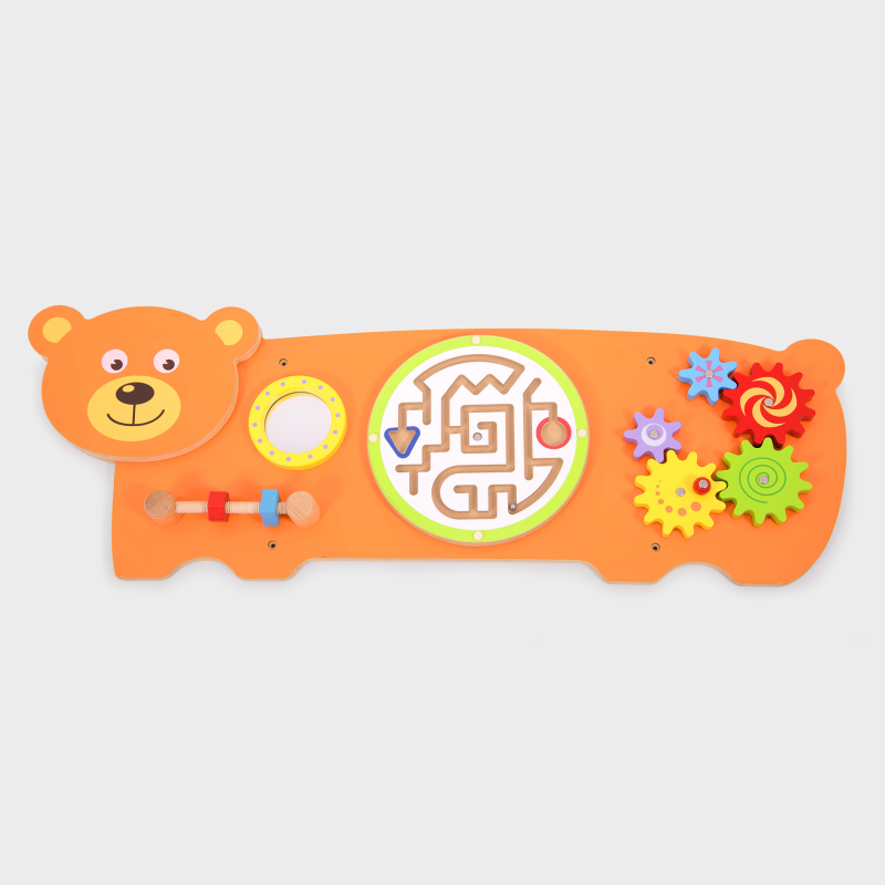 Colourful children's toy with a bear design on an orange background wall panel with educational toys.