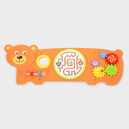 Colourful children's toy with a bear design on an orange background wall panel with educational toys.