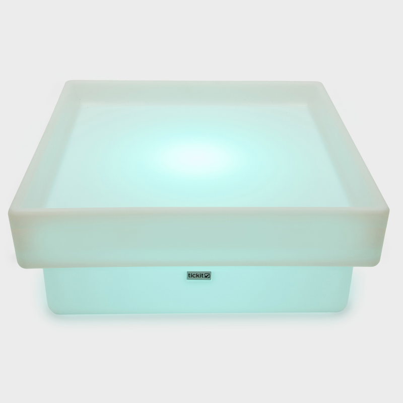 Sensory table glowing blue.