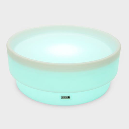Senosry Table glowing with a white rim on a light gray background