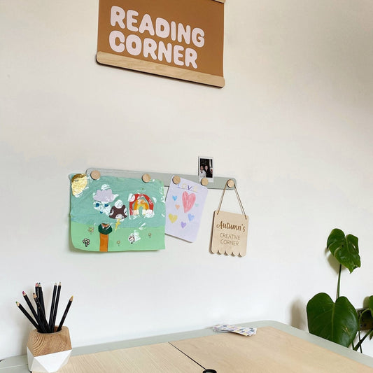 Children's desk with a 'Reading Corner' sign on the wall