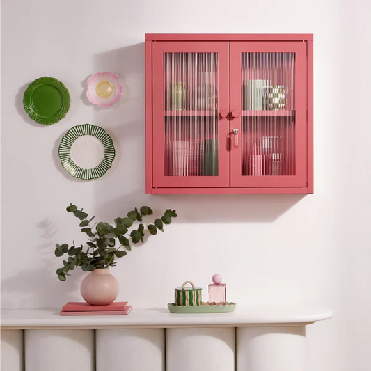 Pink cabinet on wall