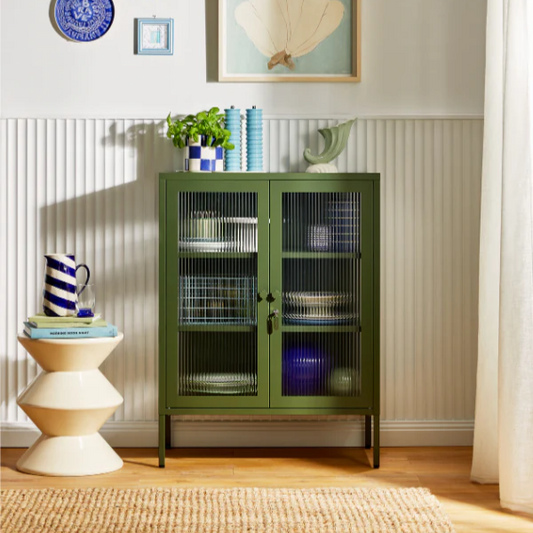 Green olive cabinet in a living area